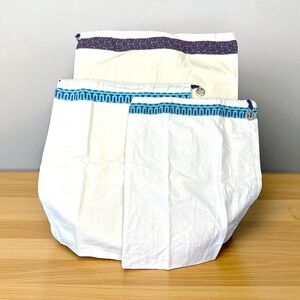 Tory Burch Set Of 3 White Canvas Bags with Purple and Blue Accents drawstring‎